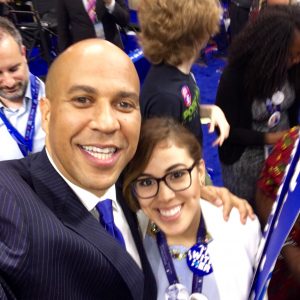 senator cory booker posing with student