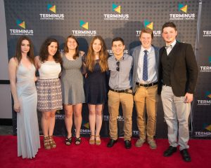 group posing on red carpet