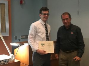 receiving award posing