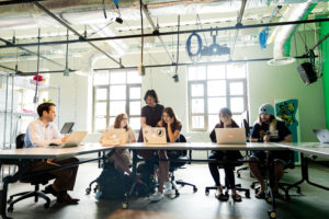 people working at conference table