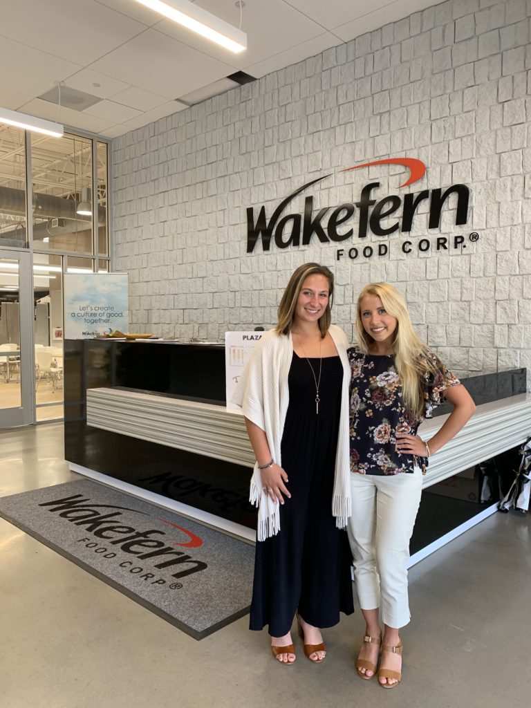 two women posing at wakefern food corp